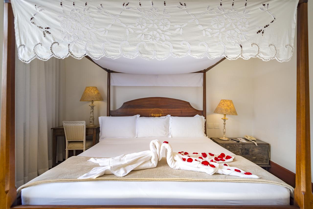 Hotel Solar do Rosário Ouro Preto  Exterior foto A bed with a bed valance